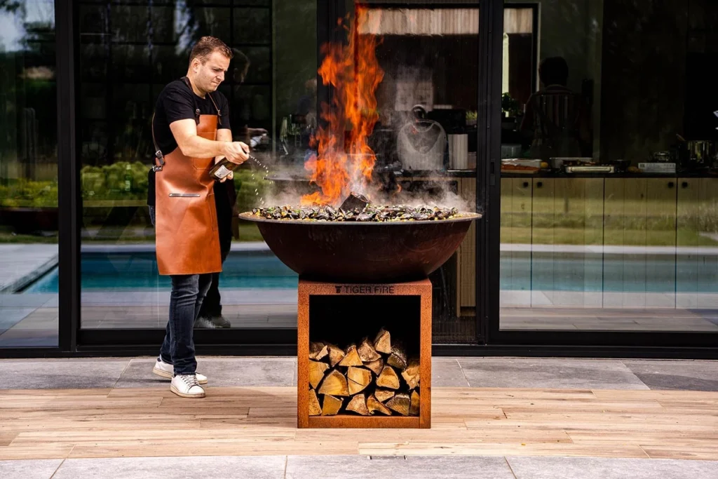 Tiger Fire Plancha BBQ - Elegant Design: "Add elegance to your garden with the stylish Tiger Fire Plancha BBQ. This sleek BBQ is a standout feature for any outdoor space. TIGER FIRE OFFICIAL STORE | TIGER FIRE SHOP | TIGER FIRE | PLANCHA BBQ | BBQ KOPEN | Kupić BBQ | Koupit BBQ | Buy a BBQ | Acheter BBQ | BBQ KAUFEN | Acquistare un BBQ | Comprar un BBQ | EINEN BBQ KAUFEN | Comprar um BBQ | FUERPLATTE PLANCHA BBQ | PLANCHA GRILL | BBQ GRIDDLE